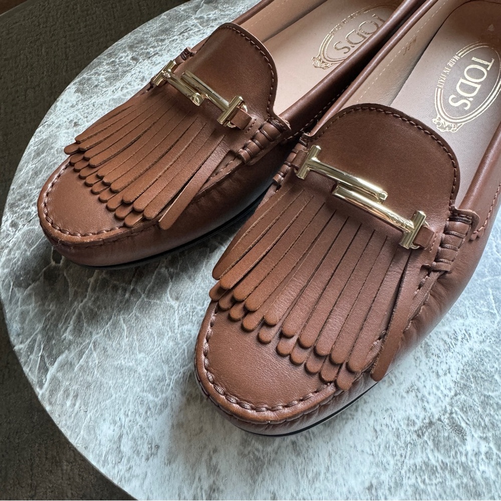 Tod’s Gommino Double T Double Fringe Loafers.